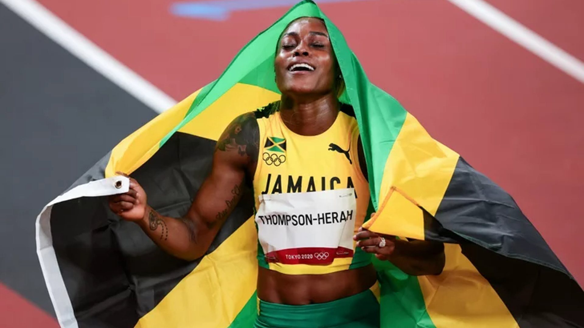 Elaine Thompson-Herah celebrating after her win (Credits- Twitter)