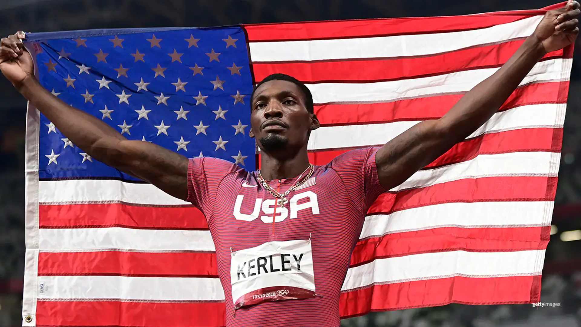 Fred Kerley holding the United States flag (Image Credits - Team USA)