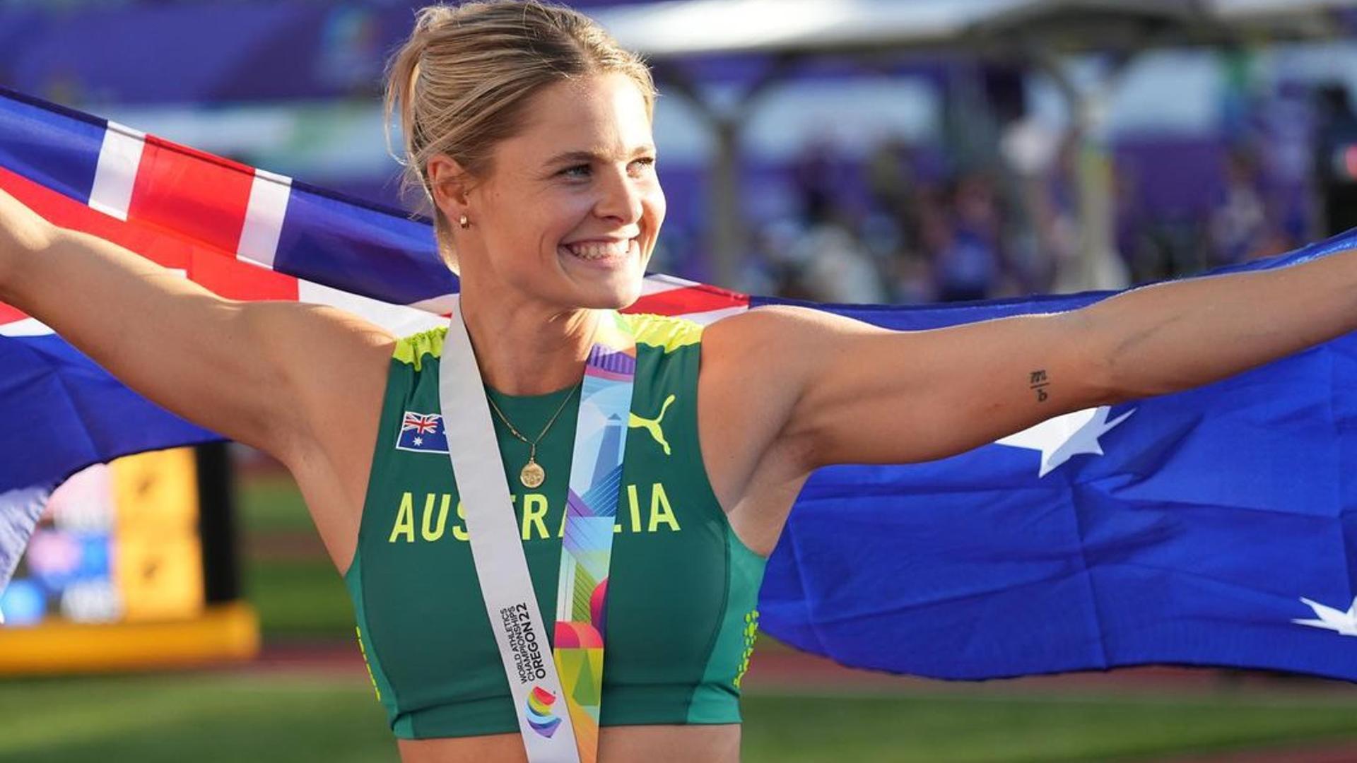 Nina Kennedy holding the Australian flag after winning the bronze at World Championships 2022 (Image Credits - Instagram/ @ninakennedy_)